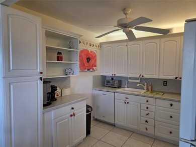 NEW ROOF, GREAT FINANCIALS. Ideally located just steps from the - photo 4