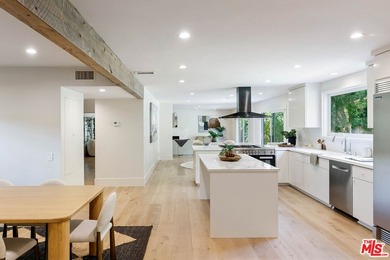 Nestled on a rare private flat lot along Sicomoro Drive in the - photo 9