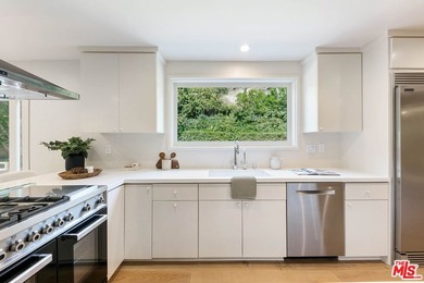 Nestled on a rare private flat lot along Sicomoro Drive in the - photo 10