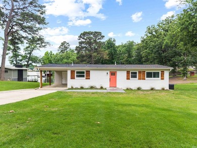 Experience waterfront living on the shores of Lake Hamilton at - photo 1