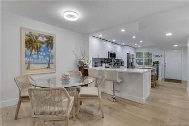Gorgeous! Completely updated 2 BD, 2BA 1ST Floor, corner unit in - photo 7