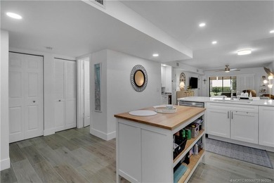 Gorgeous! Completely updated 2 BD, 2BA 1ST Floor, corner unit in - photo 8