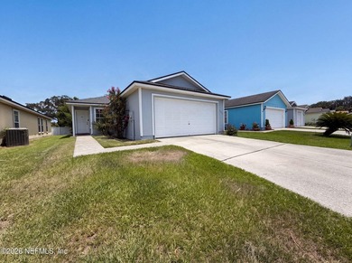 Explore 7923 Cherry Blossom Dr N, recently enhanced with fresh - photo 1