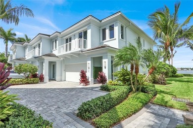 Experience elevated waterfront living in this beautifully - photo 1