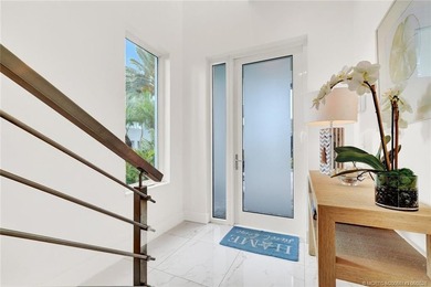 Experience elevated waterfront living in this beautifully - photo 8