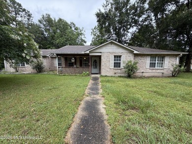 Welcome to 6173 W. Adams Street in Bay St. Louis! This spacious - photo 1