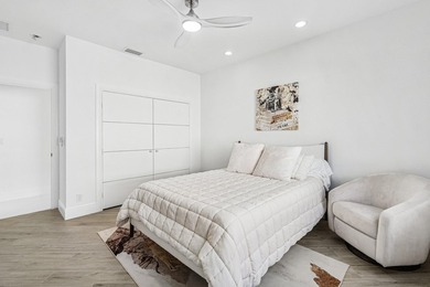 A striking, newly renovated two-story residence showcasing - photo 16