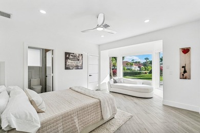 A striking, newly renovated two-story residence showcasing - photo 18