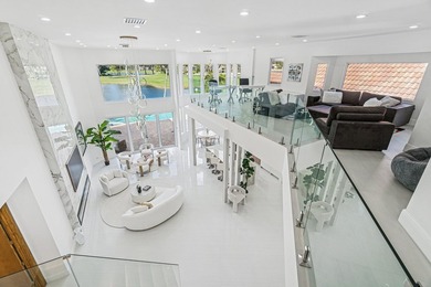 A striking, newly renovated two-story residence showcasing - photo 19