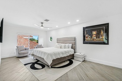 A striking, newly renovated two-story residence showcasing - photo 24