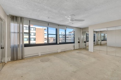 Rare find! High floor, sun-drenched, wall- of - windows