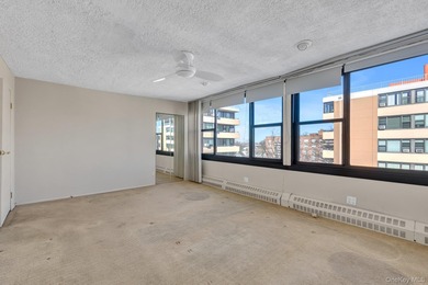 Rare find! High floor, sun-drenched, wall- of - windows