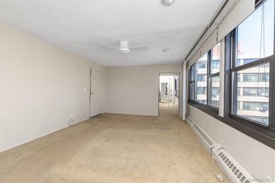 Rare find! High floor, sun-drenched, wall- of - windows