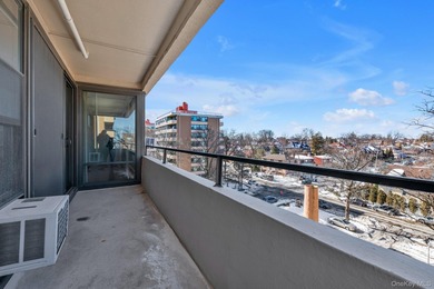 Rare find! High floor, sun-drenched, wall- of - windows