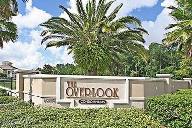 Welcome to Unit #517 at The Overlook, a sought-after gated - photo 2