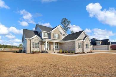 Located in the prestigious Gates Four Gated Golf Community, this