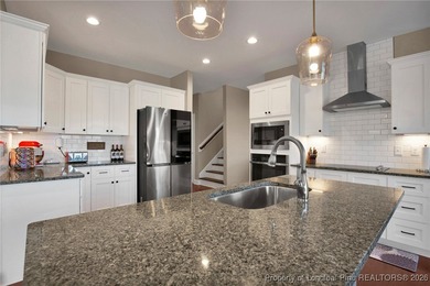 Located in the prestigious Gates Four Gated Golf Community, this