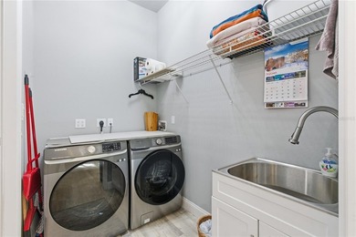 Welcome to this nearly new, 2022-built heated pool home - photo 39