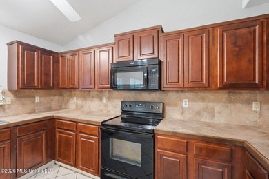 Welcome home to this spacious 4BR/2BA residence offering the - photo 8