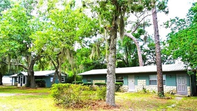 INVESTMENT OPPORTUNITY! 4 income producing units in these 2 - photo 1