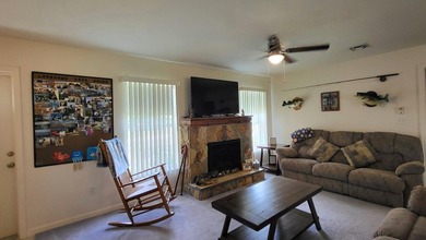 This marvelous custom-built CBS pristine, furnished home on .27 - photo 11