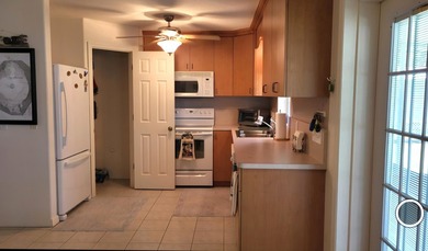 This marvelous custom-built CBS pristine, furnished home on .27 - photo 12