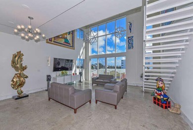 The main level offers a newer custom kitchen with marble - photo 17