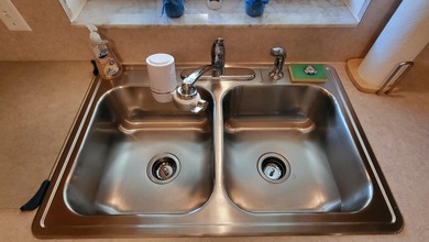 This marvelous custom-built CBS pristine, furnished home on .27 - photo 21