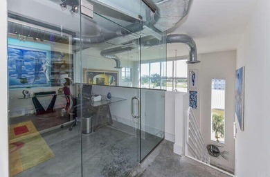 The main level offers a newer custom kitchen with marble - photo 25