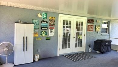 This marvelous custom-built CBS pristine, furnished home on .27 - photo 25