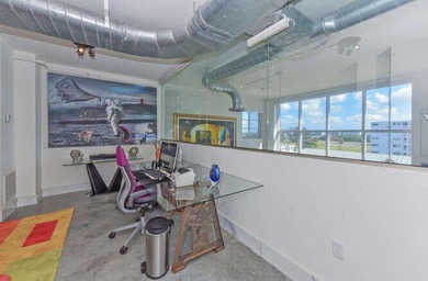 The main level offers a newer custom kitchen with marble - photo 26