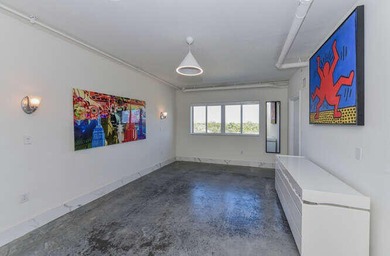 The main level offers a newer custom kitchen with marble - photo 29