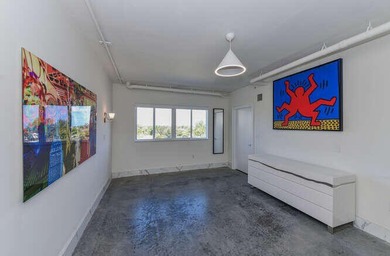 The main level offers a newer custom kitchen with marble - photo 30