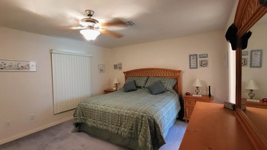 This marvelous custom-built CBS pristine, furnished home on .27 - photo 30