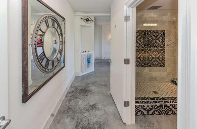 The main level offers a newer custom kitchen with marble - photo 32