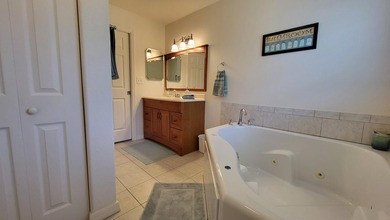 This marvelous custom-built CBS pristine, furnished home on .27 - photo 32
