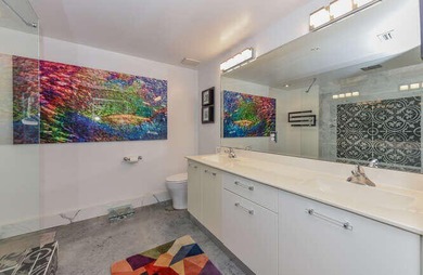 The main level offers a newer custom kitchen with marble - photo 34