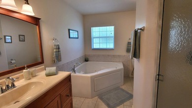 This marvelous custom-built CBS pristine, furnished home on .27 - photo 34