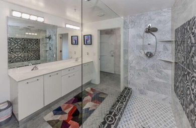 The main level offers a newer custom kitchen with marble - photo 36