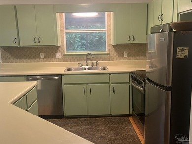Located in the Northwest Pensacola neighborhood, this home is - photo 4