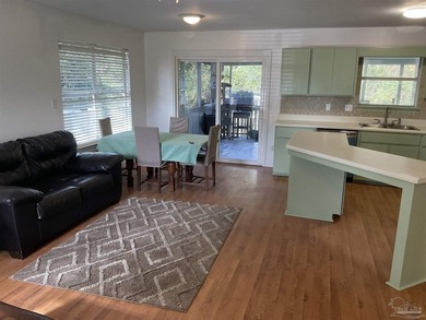 Located in the Northwest Pensacola neighborhood, this home is - photo 8