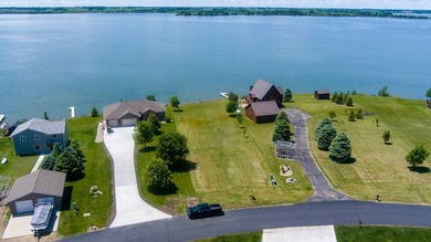 This offering consists of a bare residential lake lot located at - photo 3