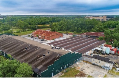 Located at the heart of the rapidly evolving Canal District - photo 2