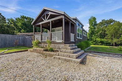 Escape to your own peaceful retreat by the lake! This charming - photo 3