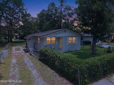 Welcome to this charming 3-bedroom, 1.5-bath home featuring a - photo 3