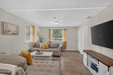 Welcome to this charming 3-bedroom, 1.5-bath home featuring a - photo 8