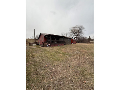 This cozy 3 bedroom, 2 bath home offers comfortable country