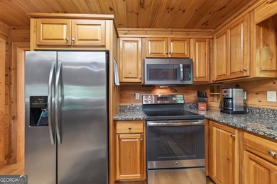 $50,000 price reduction! This cabin is priced below the - photo 15