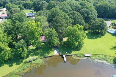 Escape to lake living with this charming waterfront home on - photo 2