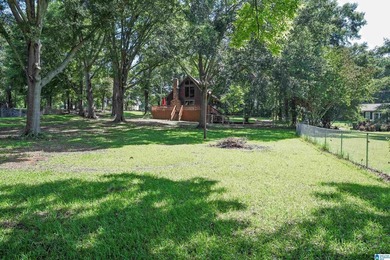 Escape to lake living with this charming waterfront home on - photo 3